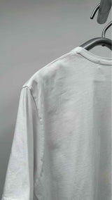 Comme Des Garçons Shirt x Jean Michel Basquiat Front - long Basquiat T-shirt