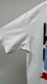 Comme Des Garçons Shirt x Jean Michel Basquiat Front - long Basquiat T-shirt